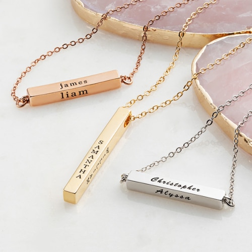 Limoges Jewelry personalized family keepsake with the 14K Gold Plated Vertical 4-Sided Engraved Family Name Necklace.